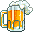 kleiner Bierkrug voller hellem Bier mit Schaumkrone