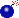 kleine runde blaue Bombe mit rot brennender Lunte