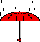 geöffneter roter Regenschirm im Regen